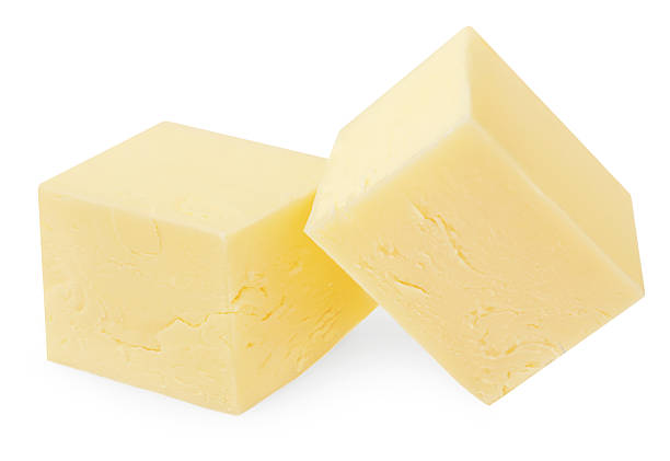 istock Butter cube isolated on white background. Fresh cow's milk butter piece close up. Package design element. 2216491573