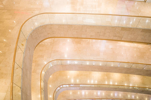Singapore - January 21, 2025: Apple store at Marina Bay Sands at night with lighting inside at Singapore on January 21, 2025. It is the World's First Floating Apple Store, designed by Foster and Partners.