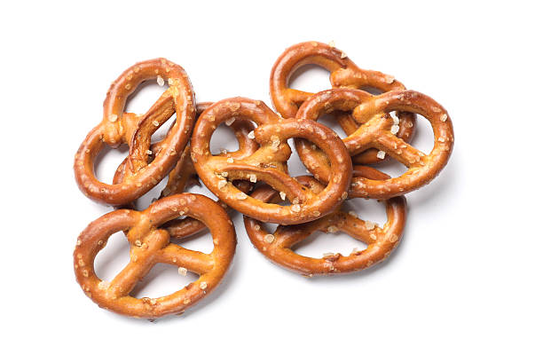 istock Many delicious pretzel crackers isolated on white, top view 2216495762