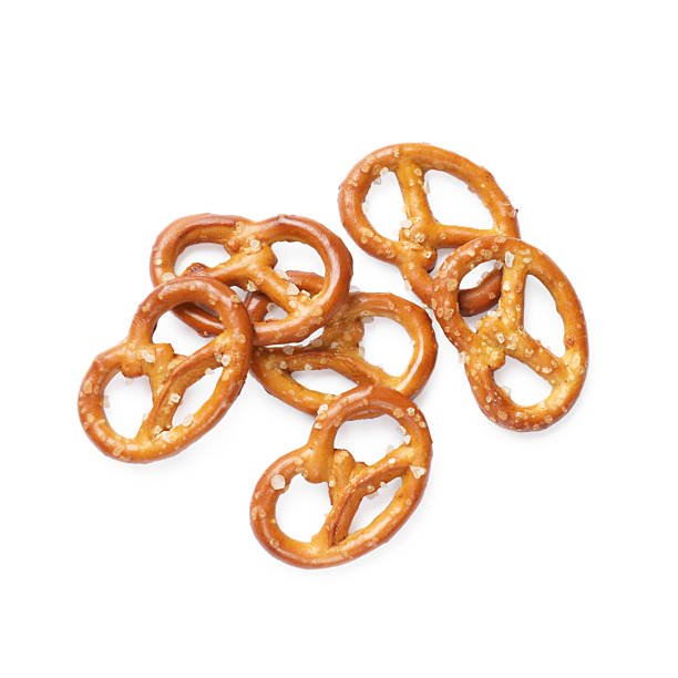 istock Many delicious pretzel crackers isolated on white, top view 2216495835