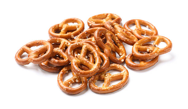istock Many delicious pretzel crackers isolated on white 2216495839