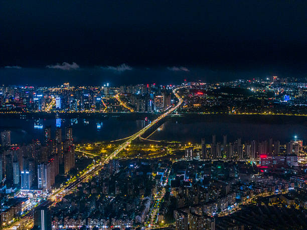 istock Night view of waterfront urban area 2216498484