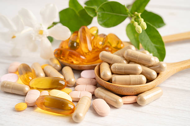 istock Alternative medicine herbal organic capsule drug herb. 2216499668