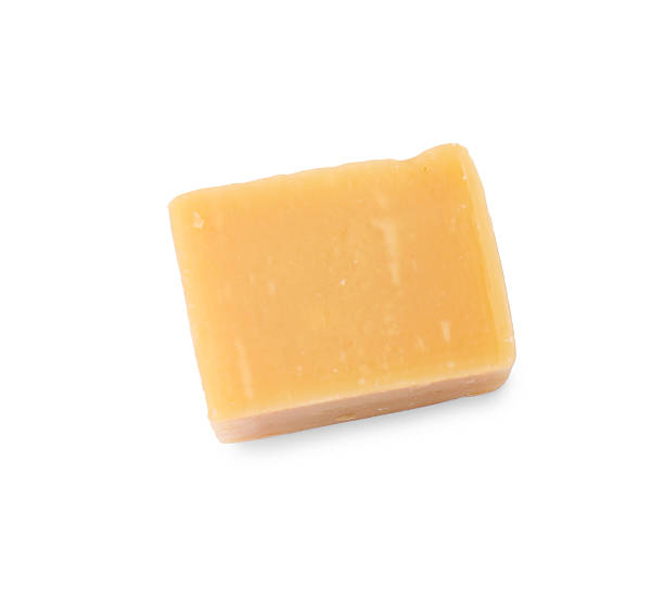 istock One tasty sweet caramel candy isolated on white, top view 2216500151
