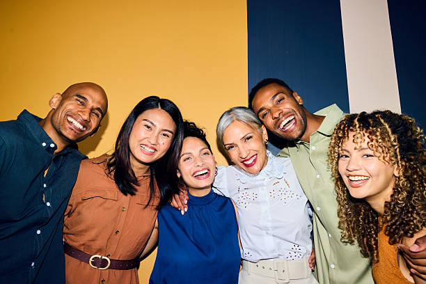 istock Six multiracial business colleagues having fun and laughing 2216501142