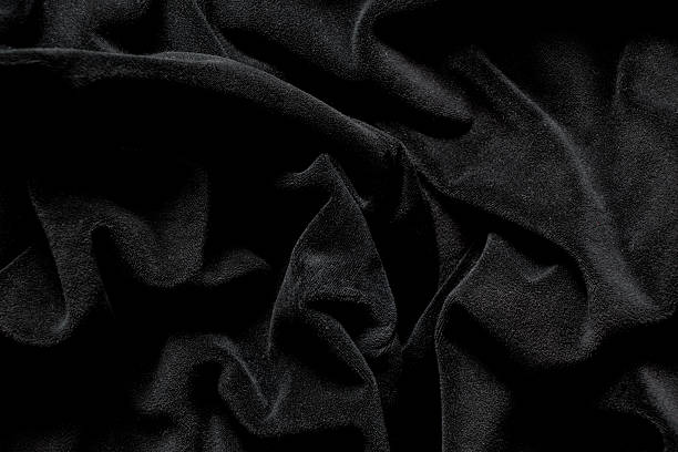 istock Black velour fabric wavy as background, women's velour tracksuit 2216503624