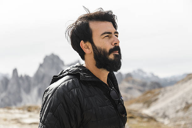 istock Man hiking in the Dolomites mountain range 2216505918
