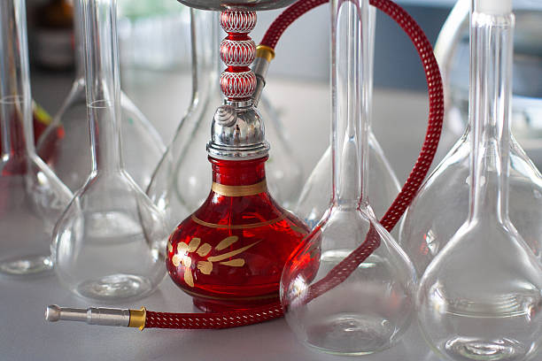 istock composition of red hookah and chemical glass flasks 2216510005