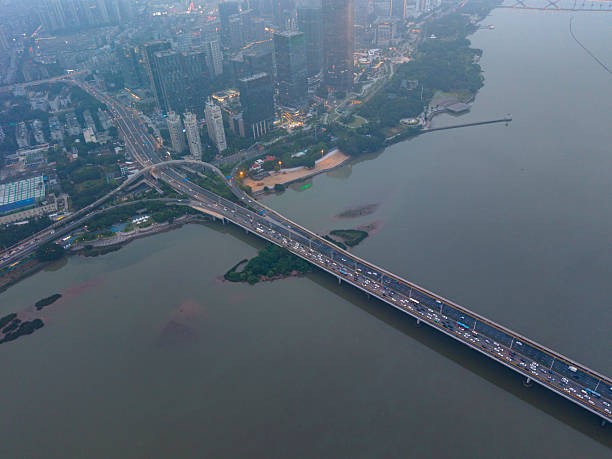 istock Aerial View of a Busy Bridge Over a River 2216510870