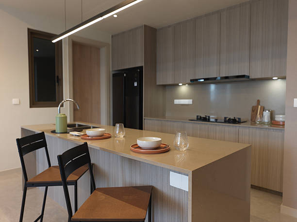 istock Modern Open Kitchen with Breakfast Bar in a Cozy Home Interior 2216511282