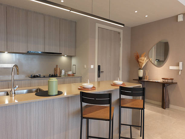 istock Modern Open Kitchen with Breakfast Bar in a Cozy Home Interior 2216511295