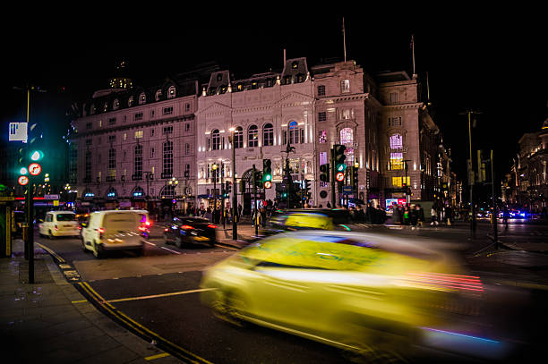 istock rainy evening in piccadilly circus in london 2216511420