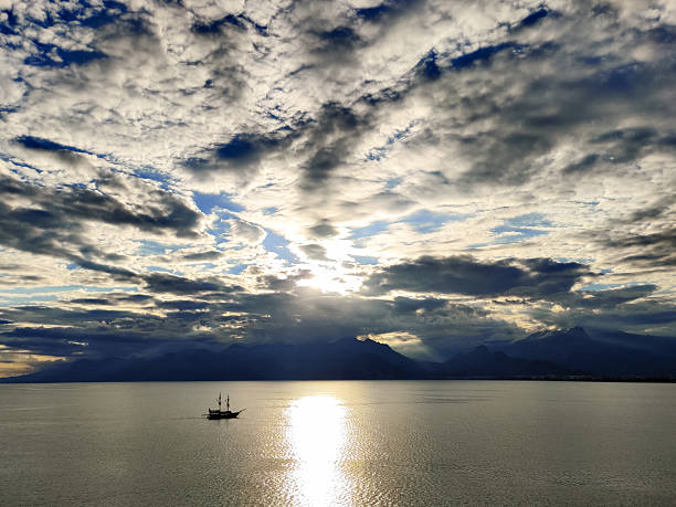 a beautiful ship is sailing in the blue sea