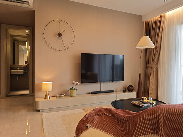 istock Modern cozy living room interior with minimalist decor and warm lighting 2216512123