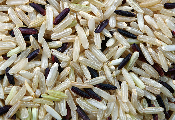 istock rice texture background close-up. wild brown rice. 2216514387
