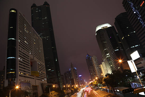 China Shenzhen city downtown tower night traffic