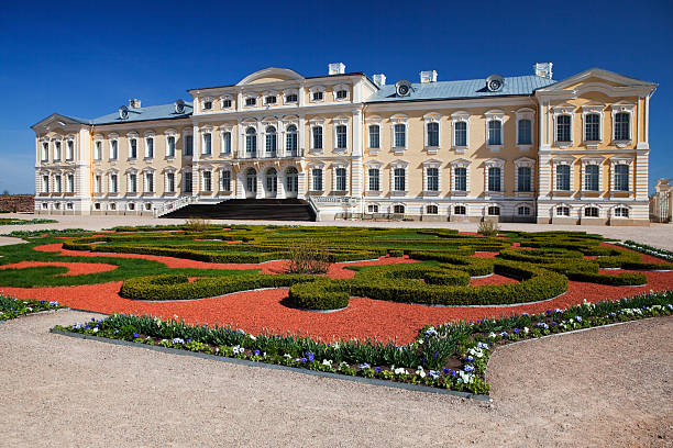 Pilsrundale, Latvia - May 3, 2009: Rundale Palace is the most important Baroque palace in Latvia. In the foreground is the palace garden