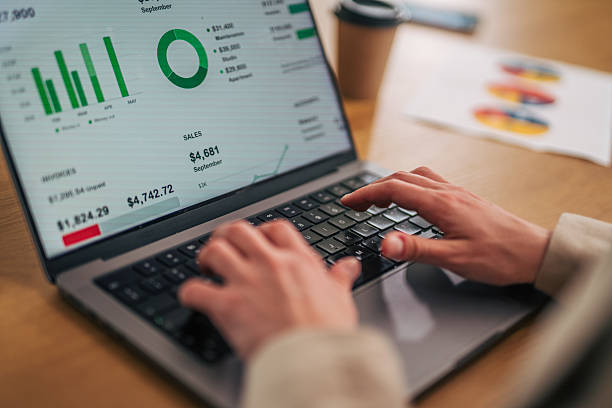 istock Businesswoman analyzing financial data on laptop 2216525734