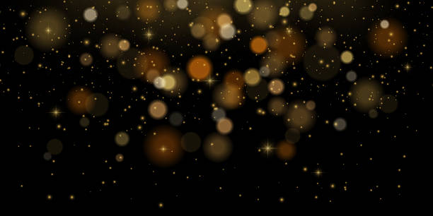 istock Golden glitter bokeh explosion with sparkles, flare and festive dust. Warm abstract light effect on dark background. Vector texture for Christmas, New Year or luxury holiday decoration themes. 2216527228