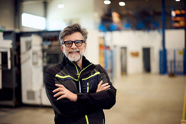 istock Confident Senior Engineer Smiling in Modern Industrial Facility Setting 2216532837