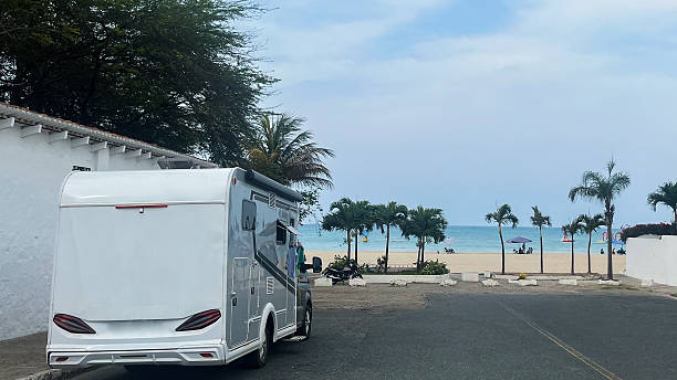 istock Modern RV motorhome while standing next to beautiful beach Playa de Chipipe with turquoise sea water in Salina in Ecuador 2216543558
