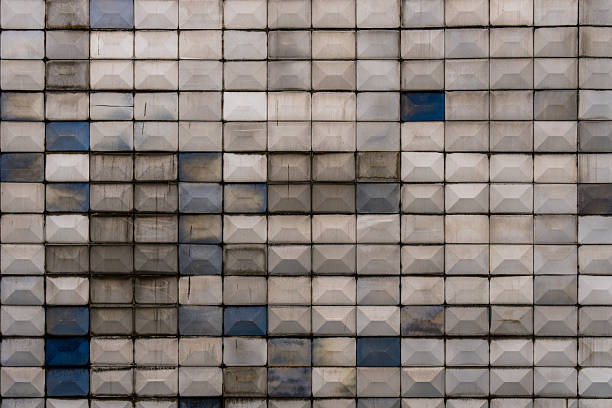 Geometric Concrete Facade with Blue Accents