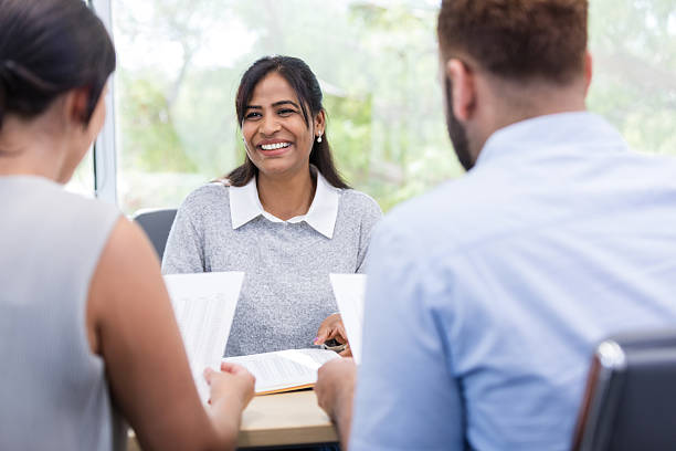 istock Happy Diverse Team Meeting in Modern Office 2216549844