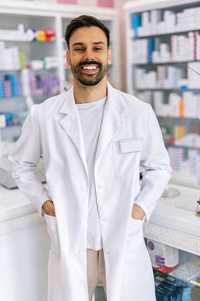 istock Young Pharmacist Posing in the Pharmacy 2216561208