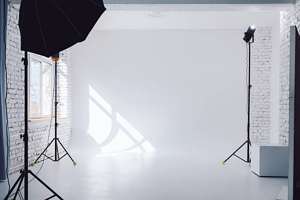 istock Clear white cyclorama. Light background with with professional lighting equipment. Plain wall empty photo studio. 2216564015