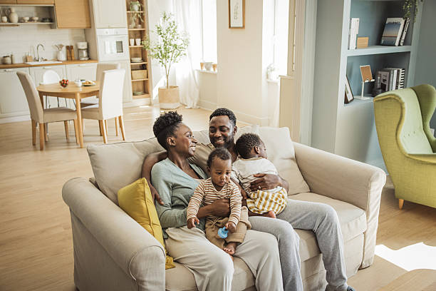 istock Happy family at home 2216567551