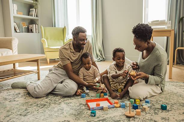 istock Happy family at home 2216567595