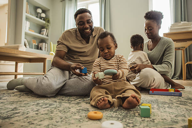 istock Happy family at home 2216567742