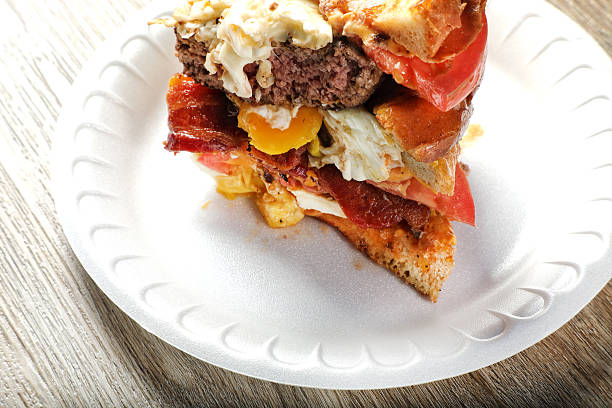 Burger with bacon, fried egg and cheese dish