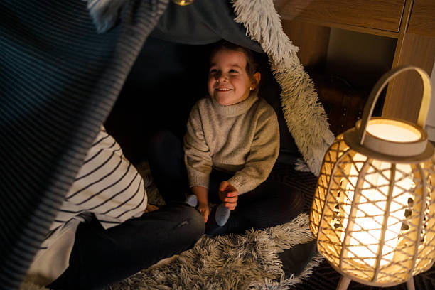 istock Sibling Bonding in a Cozy Blanket Fort 2216580005
