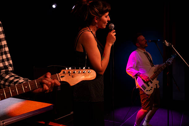 istock A music band performs live on stage, creating a lively atmosphere for their fans 2216581364
