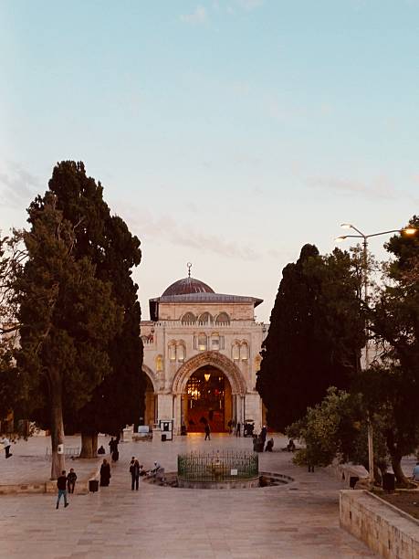 Jerusalem, Palestine - April 28, 2025 - A view of the Al-Aqsa Mosque in Jerusalem, featuring its iconic dark dome and historic limestone architecture.