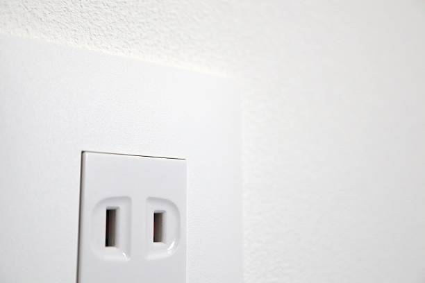 istock A Japanese wall-mounted 100V outlet. 2216593834