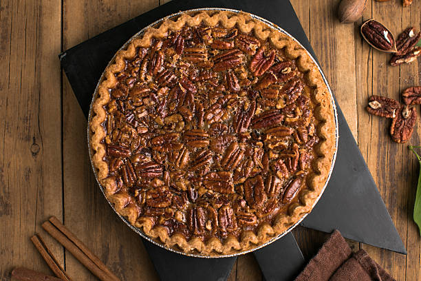 istock Fall traditional pies  pecan crumble pie overhead shot 2216596041