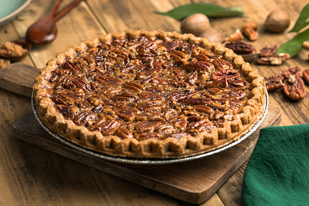 istock Fall traditional pies  pecan crumble pie overhead shot 2216596050