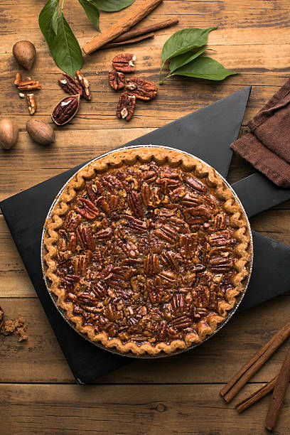 istock Fall traditional pies  pecan crumble pie overhead shot 2216596052