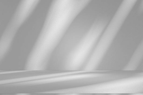 istock Wall interior background, studio and backdrops show products.with shadow from window color white . background for text insertion and presentation product 2216598382