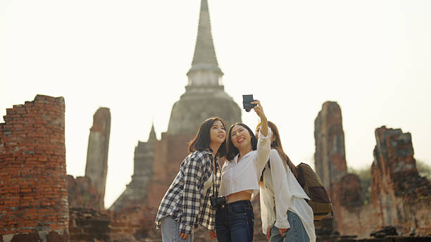 istock A group of Asian backpacker women visit wat. 2216599021