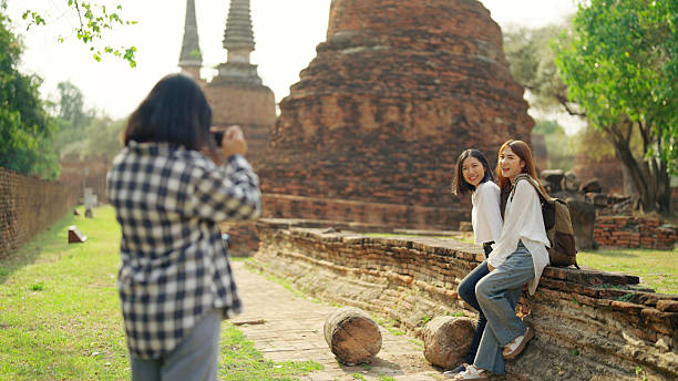 istock A group of Asian backpacker women visit wat. 2216599039