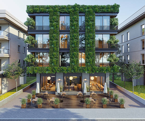 istock Eco-friendly Modern Building With Plants On Balconies And Vertical Garden 2216601862