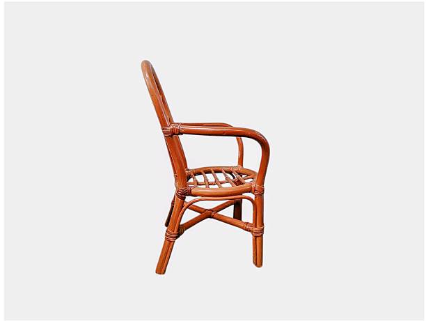 The white background in the picture is a rattan chair It uses a rattan frame as a base and is decorated with thick and strong patterns It is lightweight durable easy to move and convenient Beautiful.