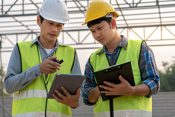istock Engineers team use tablet and check the blueprint on site. Contractor and inspector inspection construction during project.civil Forman check quality assurance. Audit, inspect, quality control. 2216604272