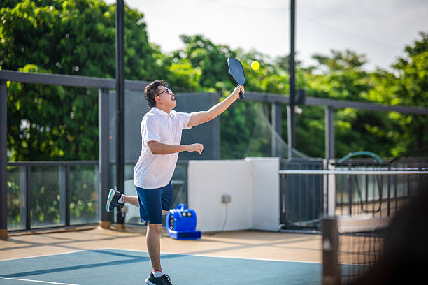 istock High Impact: Overhead Smash on the Outdoor Court 2216604461
