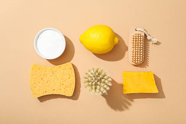 istock Soda, lemon, soap, sponge and brush on beige background, top view 2216606781