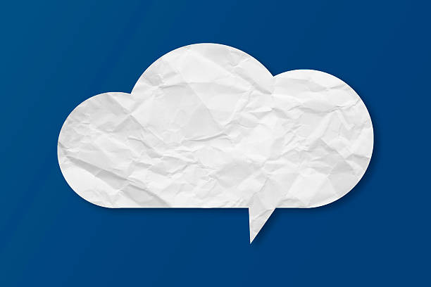 White speech bubble crumpled paper isolated on blue background