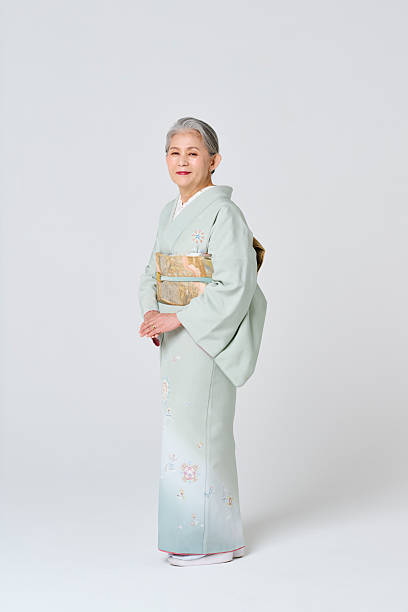 istock A senior woman wearing a light green kimono 2216608766